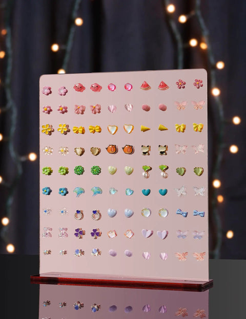 Front view of Rose Gold Mirror Finish Acrylic Earring Stand Three Pack Set with colorful earrings, showcasing 90 holes.