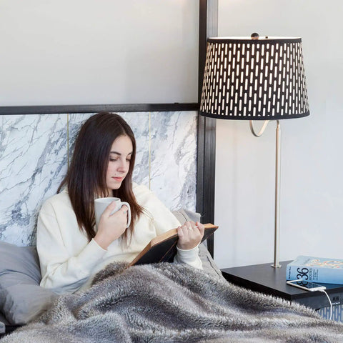 Person reading beside Madison Compact Side Table With Integrated Floor Lamp USB Port And LED Bulb, modern bedroom setup