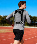 Runner wearing Lightweight Hydration Backpack for Outdoor Adventures with Waterproof Phone Pocket and Multi Pocket Layout