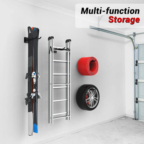 Heavyweight Garage Storage Hooks Built Like Tanks Featuring Scratch Resistant Rubber Sleeves For Rust Free Workshop Wall Tool Organization And Shop Rig Setup with skis, ladder, red mat, and tire.