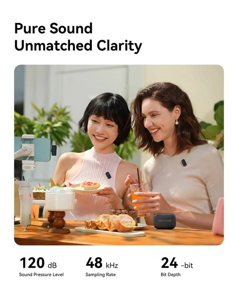 Two women using Lark A1 Wireless Microphone For iPhone And Android, dining outdoor, showcasing mic's portability and studio audio quality
