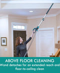 Person using Intuition Lift Up Bagged Upright Vacuum With Two Motor Power Suction And HEPA Filter No Touch Bag Tech to clean ceiling corners