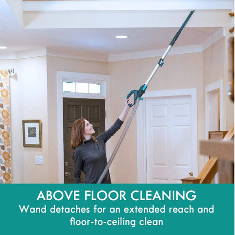 Person using Intuition Lift Up Bagged Upright Vacuum With Two Motor Power Suction And HEPA Filter No Touch Bag Tech to clean ceiling corners