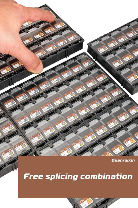 Hand holding a SMD capacitor from a neatly arranged Bang For The Buck SMD Chip Capacitor Assortment Kit Standard 1206 EIA Size Packs.