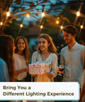 Group enjoying 98 Ft Outdoor String Lights With WiFi Control And Alexa Compatible over a patio party, creating a warm ambiance.