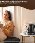 Gooseneck Electric Kettle 1L With Six Temperature Presets, 1200W Fast Heating, Auto Shut-Off, Keep-Warm, Matte Black on table near woman