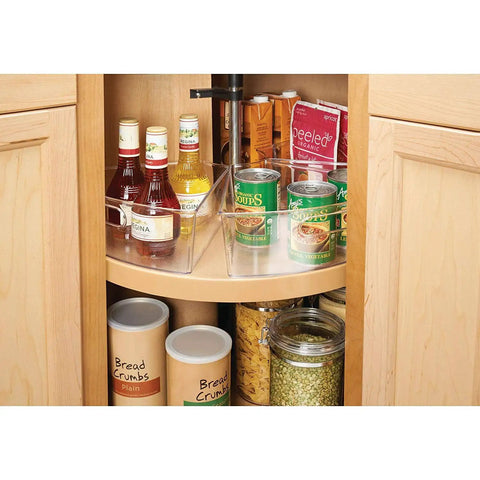 Smooth Spinning Lazy Susan Cabinet Organizer Bins For Kitchen 8 Pack arranged with bottles and cans in a corner cabinet.