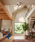 Sleek Knockout Smoke Detector Removal Tool with Rugged Aluminum Extension Pole reaching high ceiling smoke alarm.