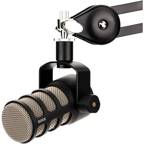 Close-up of a Rode microphone mounted on a black adjustable arm, designed for use with the Slick Pro Live Streaming Console And Broadcast Mixing Interface Packing Beast Mode Revolution Preamps Tight Neutrik Combos Independent Channel Routing Real Deck Faders And Rock Solid Quad Core Engine For Content Creators.