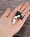 Heavy Duty Plantation Shutter Repair Pins, Spring Loaded Metal Pins For Louvers Windows, 100 Pack White, Anti Slip Grip, Bulletproof Replacement Hardware displayed in hand.