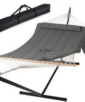 Two Person Outdoor Hammock With Stand And Carry Bag, Cotton Rope Hammock With Detachable Reversible Quilted Polyester Pad, Dark Gray, Cozy Backyard Hangout For Camping And Lounging displayed on a steel stand with carry bag.