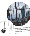 Heavy Duty Spring Loaded Gate Caster Wheel With Adjustable Tension For Smooth Rolling On Uneven Ground installed on a fence.