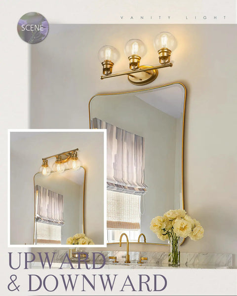 Gold Finish Sleek Modern Vanity Light Fixture With Three Clear Glass Globes Over Mirror For Bathroom Renovation