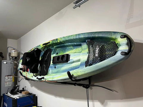 Game Changing Heavy Duty Kayak Wall Hanger Mounts Support Eighty Pounds While Swinging Out Of The Way Saves Major Garage Floor Space With Rock Solid Steel Construction For Any Canoe Or Boat, kayak mounted in garage.