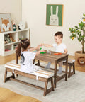 Children playing at Outdoor Kids Picnic Table Set with Cushioned Benches and Umbrella, Wooden Table in Coffee Finish, Stripe Cushions.