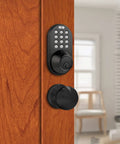 Electronic Touchpad Keyless Deadbolt and Passage Knob Combo In Oil Rubbed Bronze Finish on wooden door