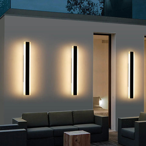 Slick Modern Outdoor Wall Lights 2 Pack Black Exterior Sconces Featuring Adjustable Four Directional Arms And Top Shelf Weatherproof Build Badass Hardwired Porch Lamps Sweet For Garage Or Patio illuminated on a wall.