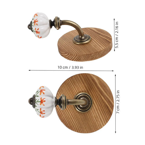 Old School Cool Antique Ceramic Wall Hooks With Rock Solid Wood Base Showstopper Entryway Coat Rack Pair detail showing colorful porcelain knob and wood base.