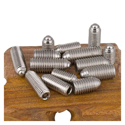 Rock Solid 304 Stainless Steel Spring Plunger M6 Grub Bolt Featuring Precision Ball Detent Fastener 30mm Long shown on wooden surface.