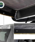 Hella Rugged Partner Side Awning Wall To Keep Your Trail Campout Rig Shade Covered Features rapid velcro clips attachment detail.