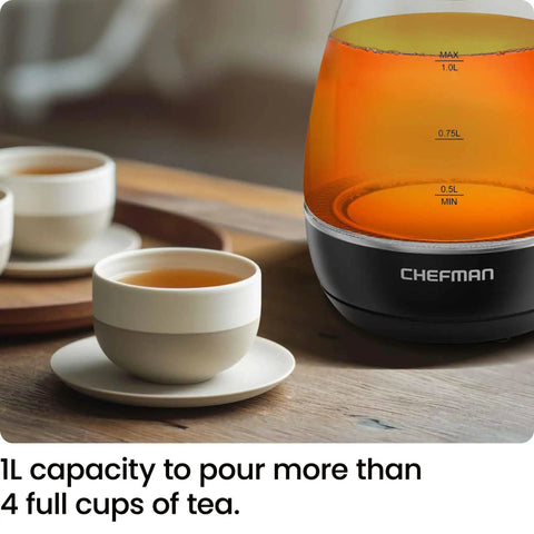 Electric Kettle With Tea Infuser 1L Compact 1500W Fast Boil Auto Shut Off No Fuss Boil Dry Protection in use with tea cups