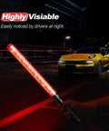 10 Pack 21 Inch LED Traffic Wands With Dual Flashing Modes High Visibility Safety Baton in dark street next to car
