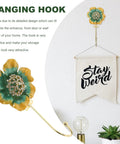 Sweet Vintage Flower Wall Hooks That Are Dang Handy For Hanging Coats Keys And Kitchen Towels Without Taking Up Valuable Space Plus The Rustic Design Looks Totally Legit In Any Room, detailed floral design with gold accent.