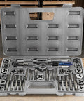 Tap And Die Set With Storage Case For Quick Threading And Rethreading Internal And External Threads Metric And SAE M3 To M12 40 Piece Pro Grade Tool Kit For Easy Repairs And Removing Broken Screws, open case displayed on workbench.