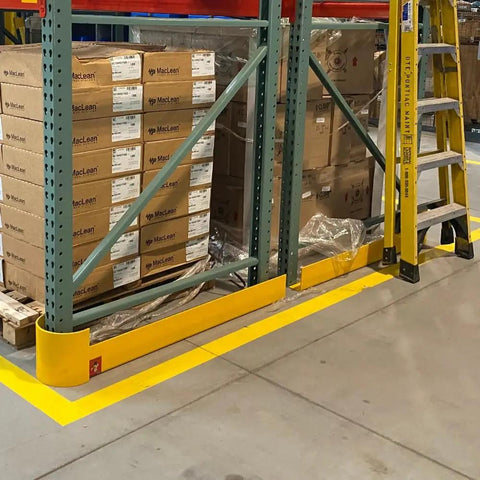 48 Inch Heavy Duty Right Hand Pallet Rack Protector Built Like A Tank Featuring Rock Hard Steel Half Moon Guard installed beside storage boxes.