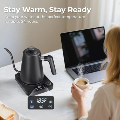 Gooseneck Electric Kettle With Precise Temperature Control Pro Grade 1L 1200W on table, with laptop and woman holding cup