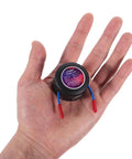 Top Shelf Automatic Aerosol Fire Extinguisher For Car Engine Garage And Apartment With Adhesive Back Mount shown in hand for size comparison.