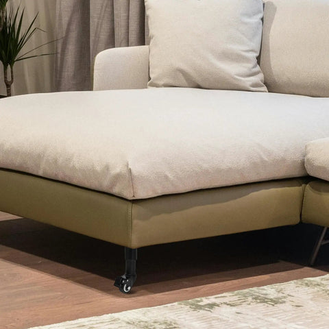 Adjustable Sofa And Bed Leg Set With Caster Wheels, Cold Rolled Steel, visible under a modern beige couch, stable support shown.