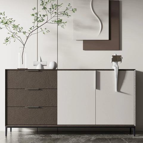 Modern cabinet with brushed nickel 5-inch edge finger pulls on drawers and doors, alongside decorative elements, minimalist style