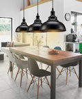 Matte Black Industrial Farmhouse Pendant Lights 3 Pack With Adjustable Rope Hangs over a modern kitchen island