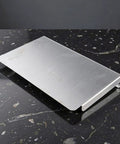 Heavy Duty Outdoor Charger Rainproof Cover Keeps Your EV Station Secure When Weather Beats Down Universal Stainless Steel Electric Box Protector resting on a dark surface.