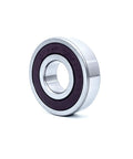 Premium Front Load Washer Tub Bearing And Seal Kit Compatible With Samsung And Kenmore Models Replace DC62 00223a DC69 00804a PS4208713 DC97 328l showing a silver washer bearing with a purple seal.