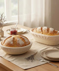 Banneton Bread Proofing Basket Set With Liners, 9 Inch Round and 10 Inch Oval Sourdough Kit on kitchen table