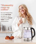 Woman in kitchen using Fast Boil Electric Kettle For Coffee And Tea 1.7L Water Boiler 1500W Borosilicate Glass Easy Clean
