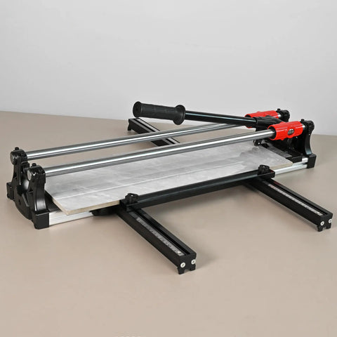 Beefy 24 Inch Manual Tile Cutter Featuring Slick Double Rail Guide System And Wide Aluminum Base on a light surface.