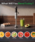 Total Game Changer Handheld Immersion Blender With Titanium Coated Blades And Variable Speed Trigger on kitchen counter with green smoothie.