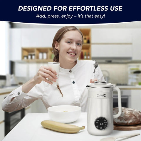 Person using 8 In 1 Nut Milk Maker Blender 32oz Capacity For Creamy Soy Almond Oat Coconut And Plant Based Non Dairy Beverages With Delay Start And Keep Warm For Easy Homemade Milks in kitchen