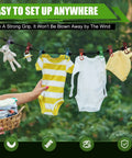 2 Pack Portable Camping Clothesline Set With 12 Colorful Clothespins And 13 Windproof Non Slip Clamps holding baby clothes