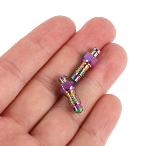 Badass Titanium Alloy Brake Bleeder Screw Set With Dust Caps For Motorcycles Mountain Road Bikes Dirt Rig in hand