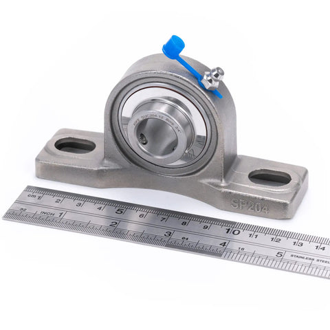 Tough As Nails 2 Pack 3/4 Inch Bore All Stainless Steel Pillow Block Bearings mounted with a ruler for size reference.