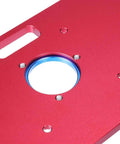 Premium Universal Aluminum Router Table Insert Plate With Heavy Gauge Ring For Kick Butt Performance And No Fuss Setup Works Flawlessly With Standard Drill Chucks 235X120X8Mm, close-up of red surface with blue ring.
