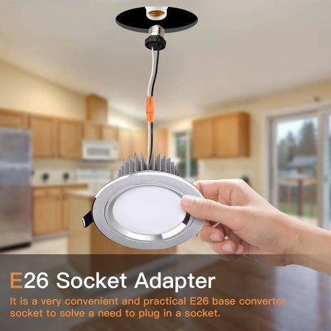 Hand holding Six Pack E26 Light Socket Adapter Pigtail For LED Ceiling Downlights Plug And Play Screw In Male Socket Converter