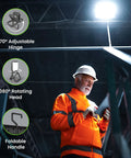 Worker using Ultra Bright 2000 Lumen Portable LED Work Light With 3 White Light Modes for workshop, highlighting adjustable hinge and handle.