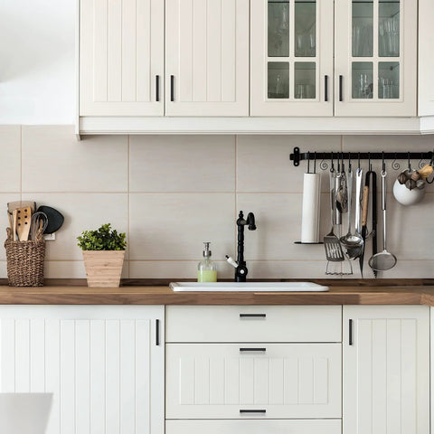 Modern kitchen with 30 Pack 4 Inch Square Kitchen Cabinet Handles Matte Black Drawer Pulls installed on white cabinets