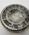 Hardcore Heavy Duty 21315 Hl Spherical Bearing Featuring Abec One Precision High Chrome Steel Sized At 75 X 160 X 37 mm for tough machinery use, wrapped for protection.