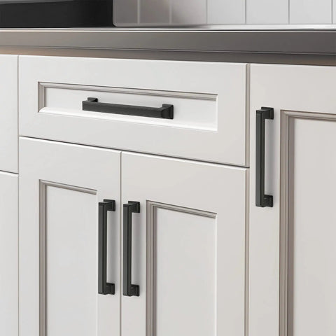 Insanely Sleek Matte Black Cabinet Pulls For Kitchen Drawers And Pantry Doors Dead Solid Metal Build With Zero Hassle Mounting And Grippy Finger Hold Twenty Piece Pack Spanning Five Inch Hole Centers on modern white cabinets.